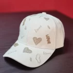 کلاه نقاب‌دار زنانه طرح قلب رنگ کرم